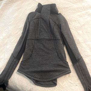 Never worn lululemon 3/4 zip jacket. Warm. In great condition.